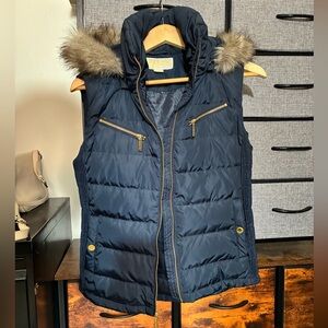 Michael Kors women's navy puffer vest with a faux fur trim, removable hood.